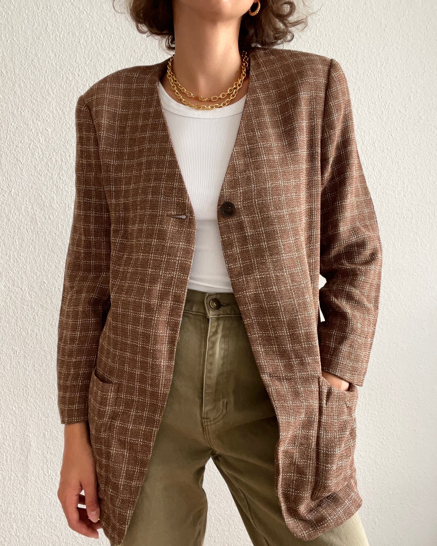 Brown blazer with white check pattern and epaulette