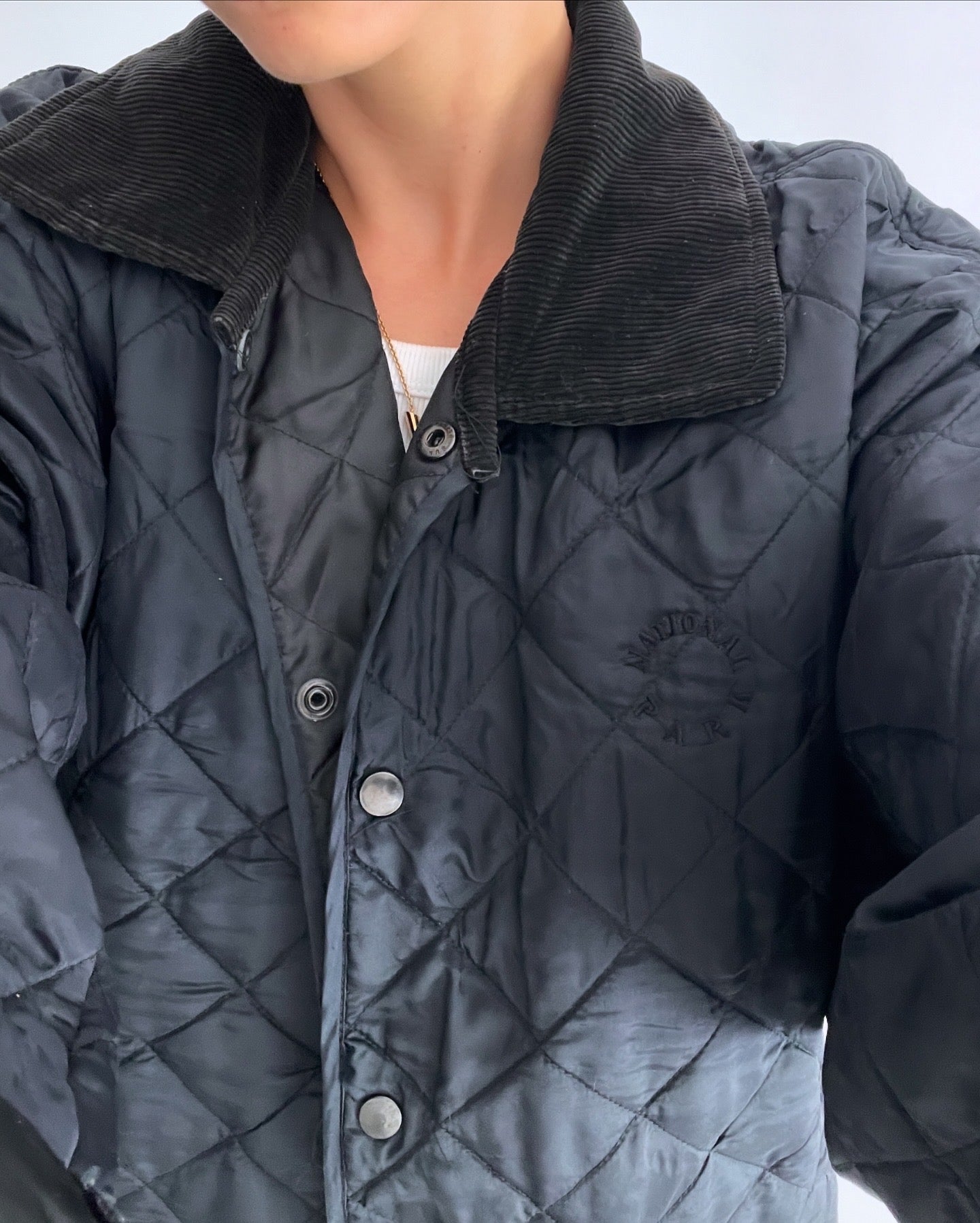 Oversized black quilted jacket