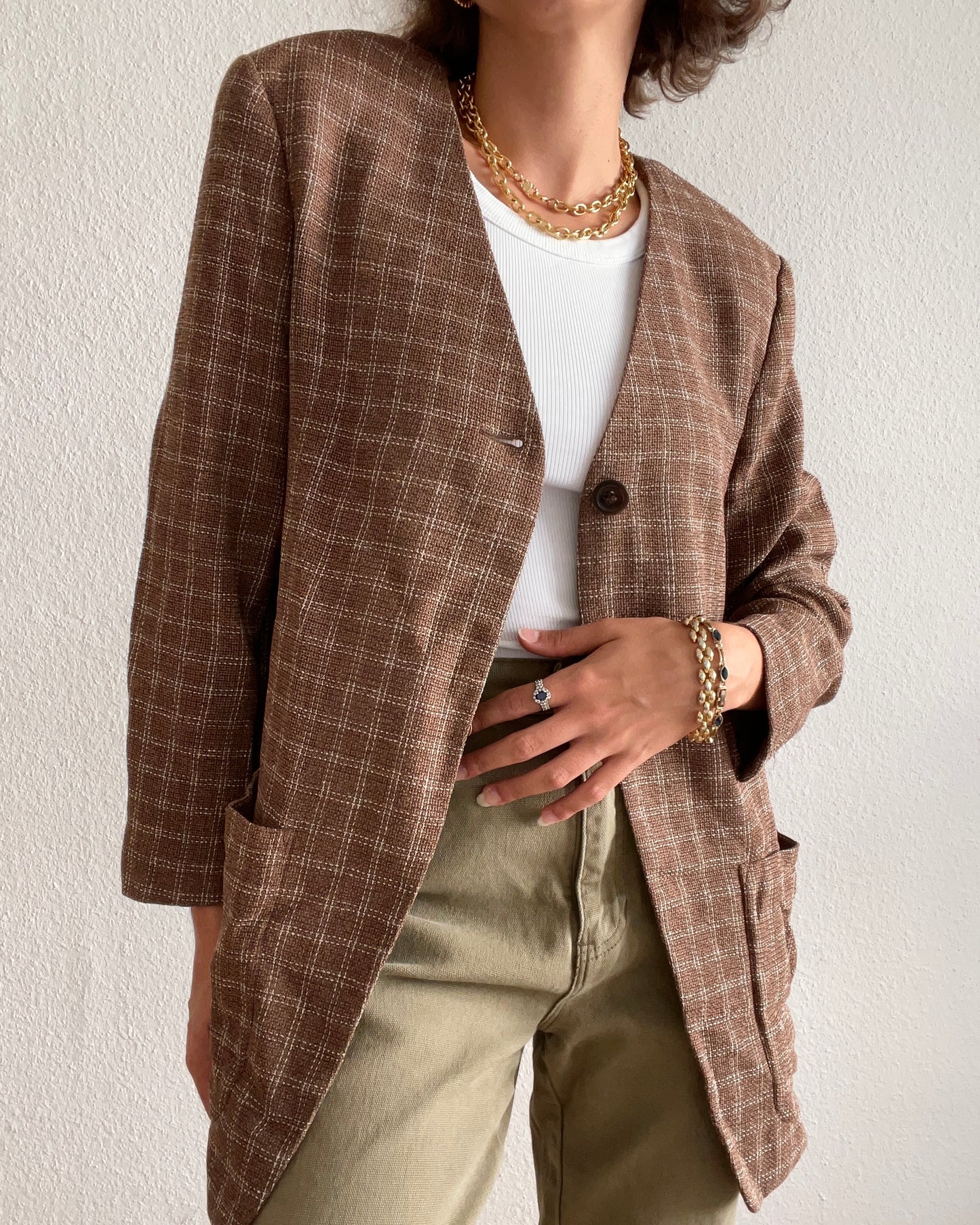 Brown blazer with white check pattern and epaulette